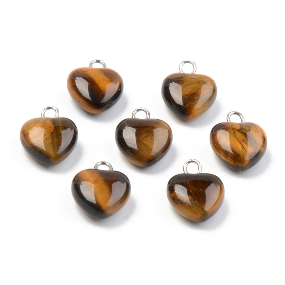 Tiger Eye Heart Charms, Yellow Brown Color with Platinum Brass Findings. Semi-precious Gemstone Pendant for DIY Jewelry Making.  Size: 13-14mm Length, 10-10.5mm Wide, 5mm Thick, Hole: 1.8mm, 1pcs/package.   Material: Genuine Natural Tiger Eye Stone Pendant, Platinum Toned Brass Findings. High Quality, Heart Shaped Stone Pendants. Shinny, Polished Finish. 
