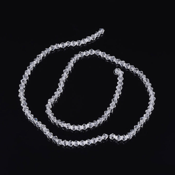 Glass Beads, Faceted, Transparent, Clear, Bicone, Crystal Beads for DIY Jewelry Making.  Size: 4mm Length, 4mm Width, Hole: 1mm; approx. 92pcs/strand, 13.75" inches long.  Material: The Beads are Made from Glass. Austrian Crystal Imitation Glass Crystal Beads, Bicone, Transparent, Clear Beads. Polished, Shinny Finish. 