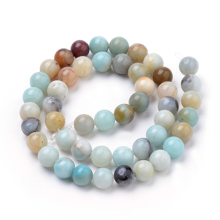 Natural Amazonite Beads, Round, Multi-Color. Semi-Precious Amazonite Beads for DIY Jewelry Making.   Size: 10mm Diameter, Hole: 1mm, approx. 38-40pcs/strand, 15" inches long.  Material: Genuine Natural Multi-Colored Amazonite, Loose Stone Beads, Multi-Color, Polished, Shinny Finish.   Amazonite Properties: Amazonite Beads are known as the Stone of Hope. It is Believed to have a Soothing Effect on the Nervous System. Amazonite is also Associated with Money, Luck and Overall Success. 