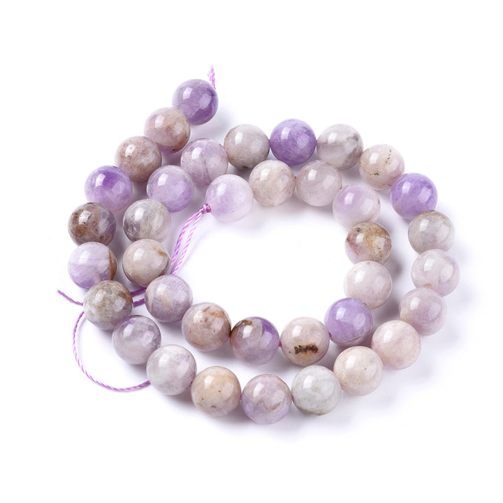 Stunning Natural Lavender Jade Beads, Round, Lavender/Lilac Color. Semi-Precious Crystal Gemstone Beads for Jewelry Making. Great for Stretch Bracelets.  Size: 4mm in Diameter, Hole: 1.1mm; approx. 90pcs/strand, 15" inches long.  Material: The Beads are Natural Lavender Jade, Lilac Color. Polished, Shinny Finish.  Lavender Jade Properties: Also Known as Lilac Jade Stone. Lilac Jade is the Stone of Angels. Its Believed to Enlighten You in a Spiritual Way and Infuse You with Humility. 