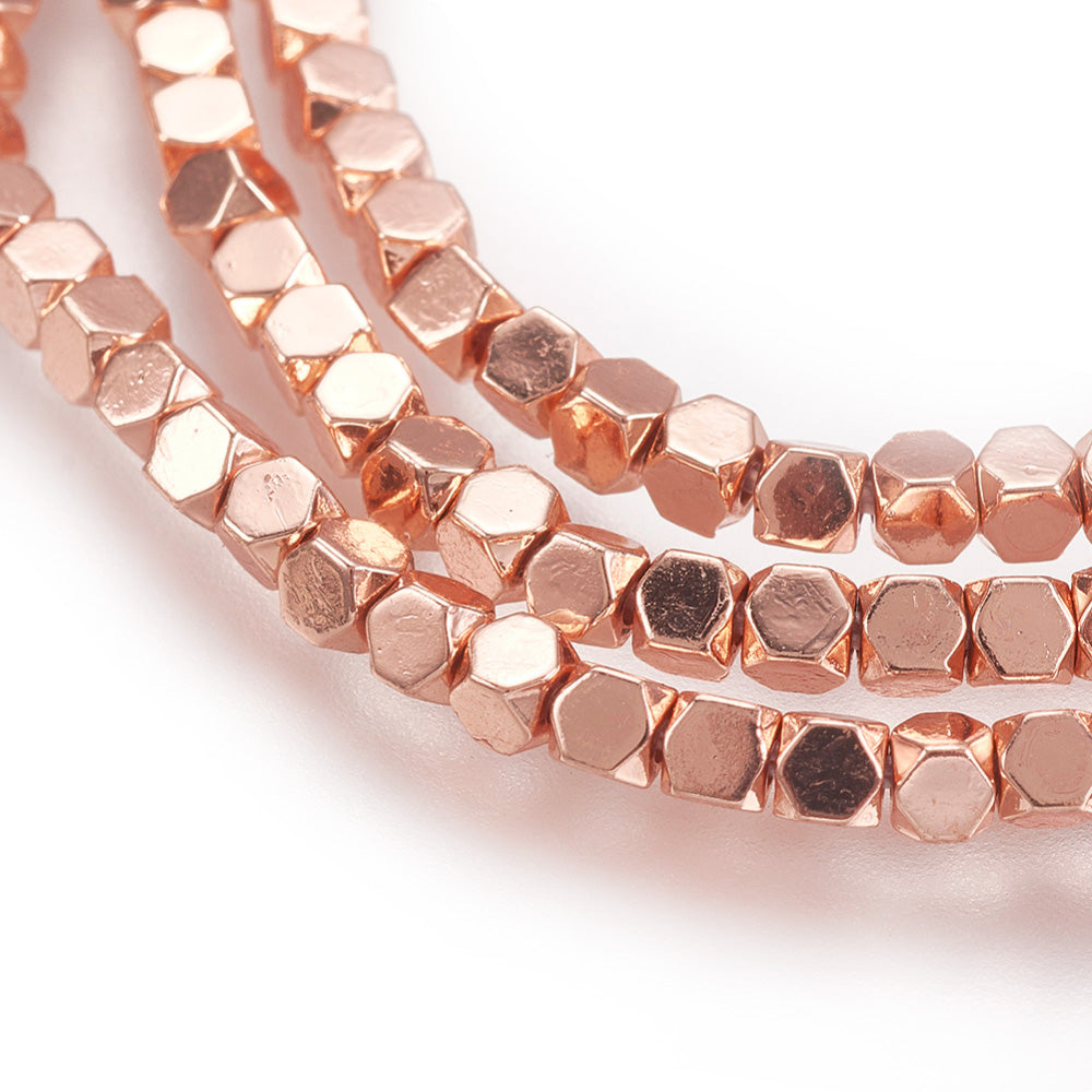 Premium grade Rose Gold, Faceted, Square Hematite Spacer Beads, Electroplated Non-magnetic Synthetic Hematite Beads. Semi-Precious Stone Rose Gold Spacers for Jewelry Making.  Size: 4mm Length, 4mm Width, hole: 0.8mm; approx. 93-96pcs/strand, 15.7 inches.  Material: Grade AA Faceted, Square Shaped, Non-Magnetic Synthetic Electroplated Rose Gold Hematite Loose Spacer Beads. Rose Gold Plated Spacers. Polished, Shinny Finish.   